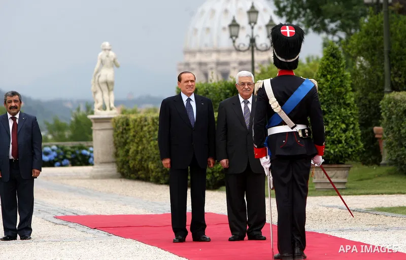Palestinian President Mahmoud Abbas and Italy's Prime Minister Silvio Berlusconi review an honour guard during a meeting on June 3, 2011 at Villa Pamphili in Rome. Photo by Thaer Ganaim