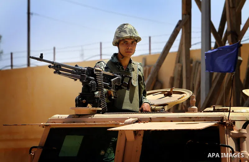 Egyptian soldiers stand guard in front of the blocked Rafah border crossing between Egypt and southern Gaza Strip 04 June 2011. Egyptian authorities reopened its Rafah border crossing with the Gaza Strip after a temporar...