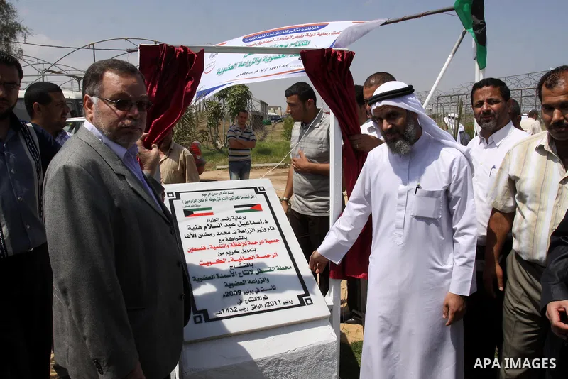 Palestinian Minister of Agriculture Mohammad Aga opens Qastal station for the production of organic manure in Gaza city on June 6, 2011. Photo by Mohammed Asad