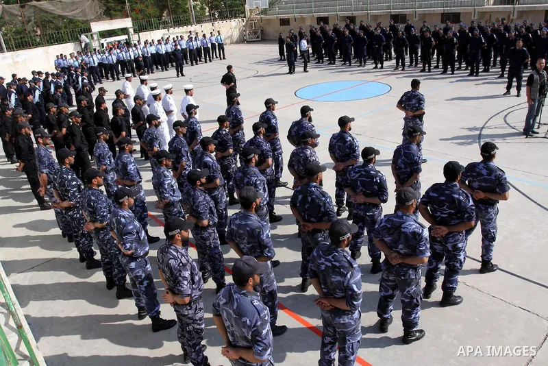 Palestinian Hamas officers and noncommissioned officers stand at attention to meet the new Director General of the Palestinian police Tayseer Al Batesh in Gaza city on June 7, 2011. Photo by Mohammed Asad