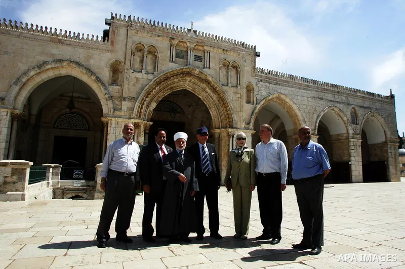 Palestinian Grand Mufti, Mohammed Hussein with the former Prime Minister of Norway and his wife tour inside Al-Aqsa mosque compound during their visit to Jerusalem's old city on June 9,2011. Photo by Mahfouz Abu Turk