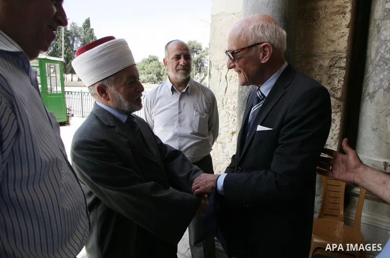 Palestinian Grand Mufti, Mohammed Hussein with the former Prime Minister of Norway and his wife tour inside Al-Aqsa mosque compound during their visit to Jerusalem's old city on June 9,2011. Photo by Mahfouz Abu Turk