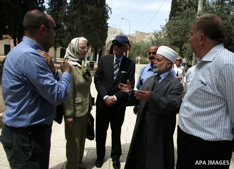 Palestinian Grand Mufti, Mohammed Hussein with the former Prime Minister of Norway and his wife tour inside Al-Aqsa mosque compound during their visit to Jerusalem's old city on June 9,2011. Photo by Mahfouz Abu Turk
