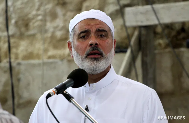 Palestinian Prime Minister in Gaza Strip, Ismail Haniya delivers speech during the funeral of Mohammed Shamaa, one of the Hamas Movement founders, after Friday prayers at Omari mosque in Gaza city on June 10,2011. Photo...