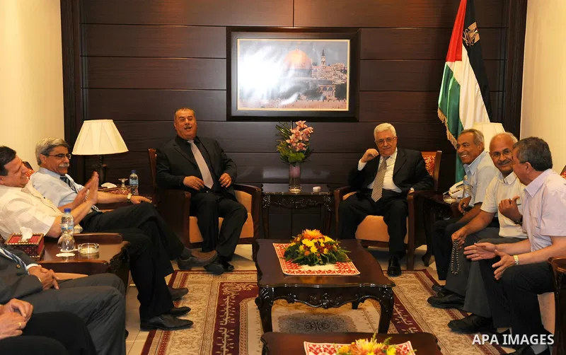 Palestinian President Mahmoud Abbas (Abu Mazen) meets with the deputy Mohammed Baracka in the West Bank city of Ramallah on June 10, 2011. Photo by Mufeed Abu Hasnah..