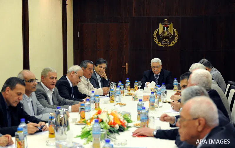 Palestinian President Mahmoud Abbas (Abu Mazen) heads the meeting of the Central Committee of Fatah movement to discuss candidates for prime minister in the interim government in the West Bank city of Ramallah on June 11...