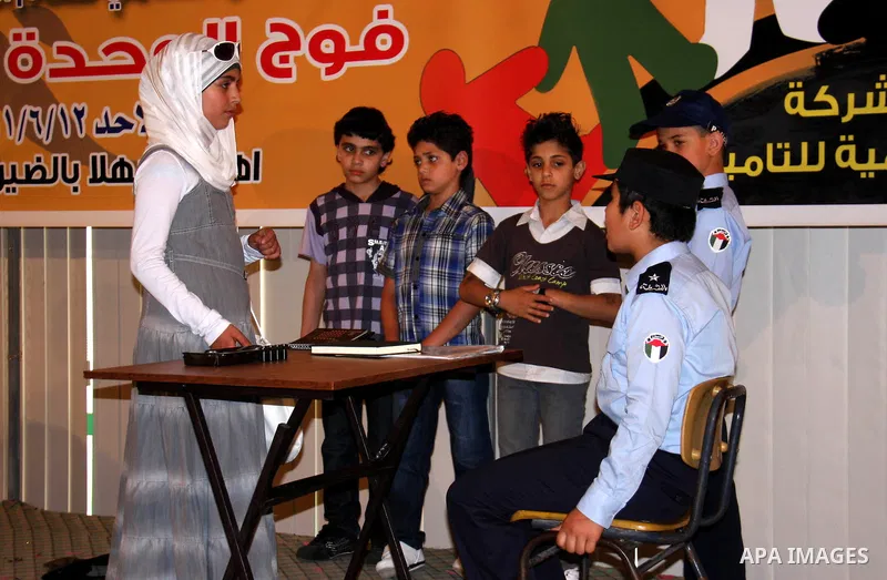 Palestinian children participate in the graduation ceremony at their kindergarten in the West Bank city of Nablus on June 12,2011. Photo by Wagdi Eshtayah