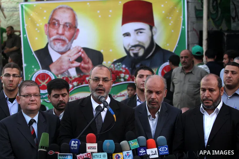 The member of the Muslim Brotherhood, Ezz El-Deen Al-Hussini speaks to Media during his visit to the condolences tent of Mohammed Shamaa, one of the Hamas movement founders, in Gaza city on June 12,2011 during the visiti...
