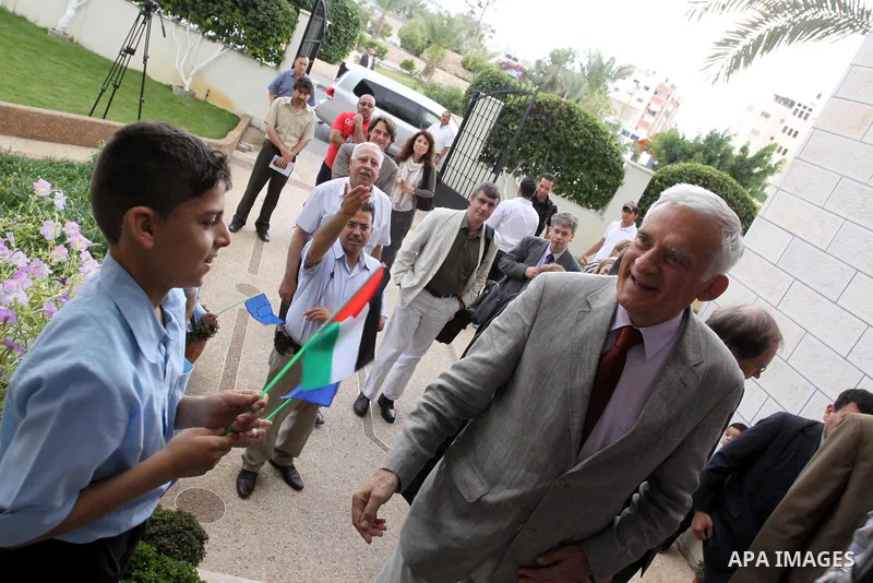 European Parliament President Jerzy Buzek meets Palestinian children during his visit to Deaf Center in Gaza City on June 13, 2011. Photo by Mohammed Asad