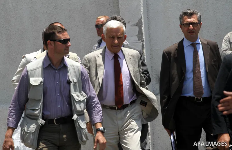 European Parliament President Jerzy Buzek walks during his visit to UNRWA headquarters in Gaza City on June 13, 2011 . Photo by Mohammed Asad