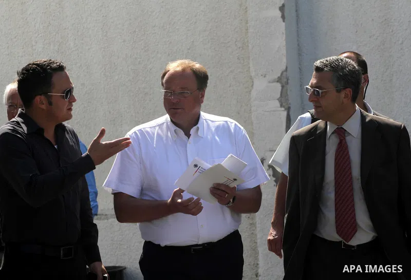 German Development Minister, Dirk Nebel walks with officials after a press conference at the UNRWA headquarters in Gaza city on June 14,2011. Photo by Mohammed Asad