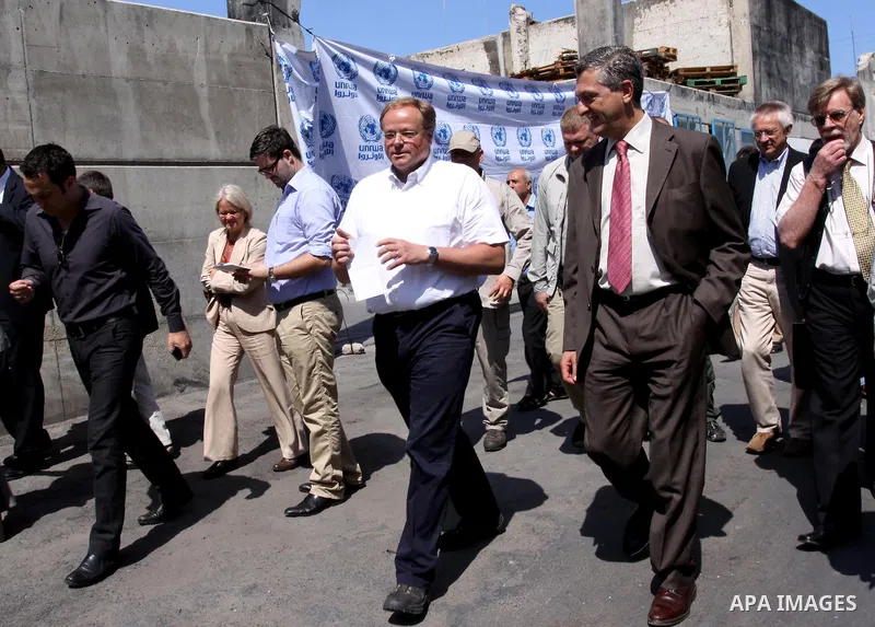 German Development Minister, Dirk Nebel walks with officials after a press conference at the UNRWA headquarters in Gaza city on June 14,2011. Photo by Mohammed Asad