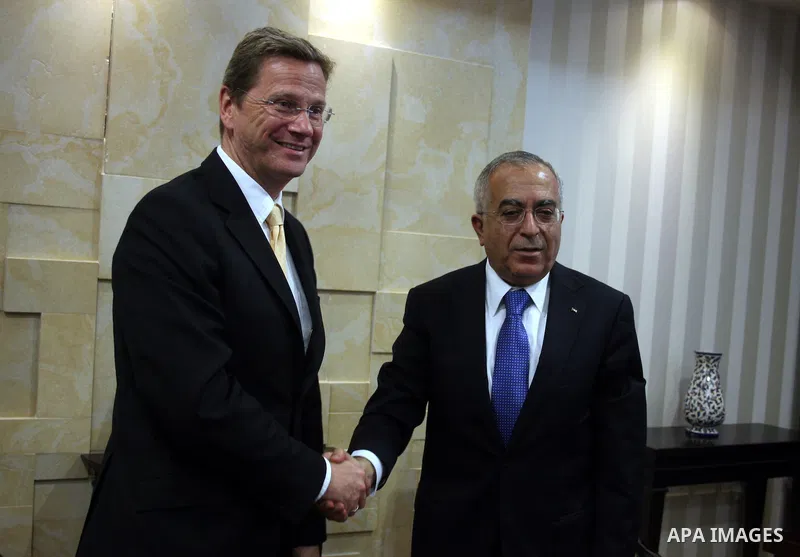 German Foreign Minister Guido Westerwelle meets with Palestinian prime minister Salam Fayyad in the West Bank city of Ramallah during an official visit on June 14, 2011. Photo by Issam Rimawi