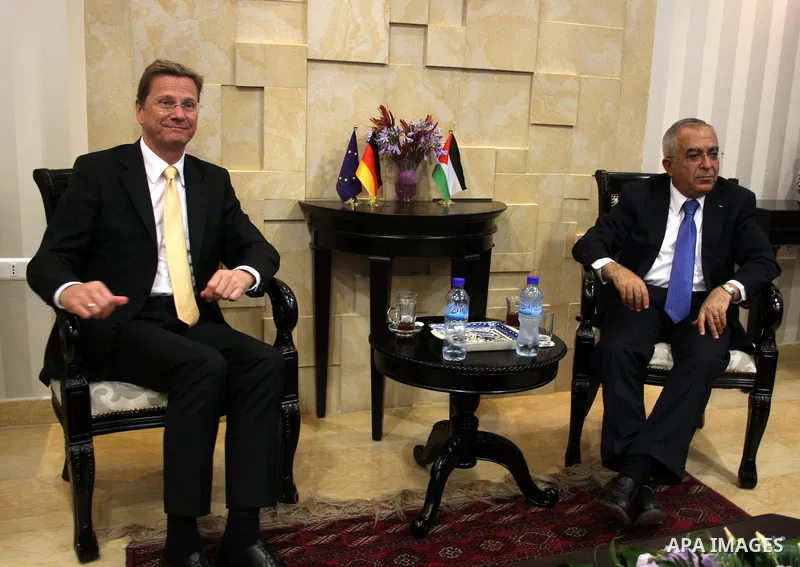 German Foreign Minister Guido Westerwelle meets with Palestinian prime minister Salam Fayyad in the West Bank city of Ramallah during an official visit on June 14, 2011. Photo by Issam Rimawi