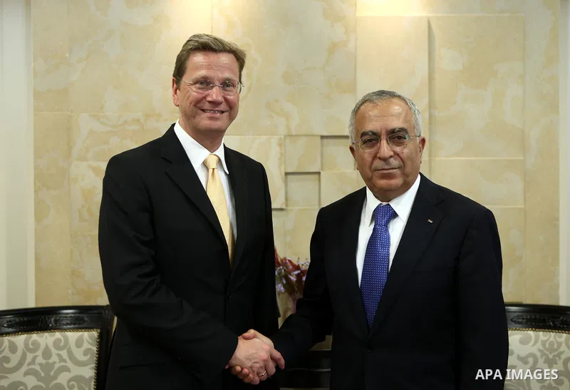 German Foreign Minister Guido Westerwelle meets with Palestinian prime minister Salam Fayyad in the West Bank city of Ramallah during an official visit on June 14, 2011. Photo by Mustafa Abu Dayeh