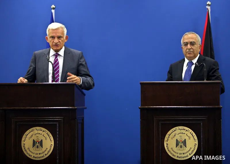 European Parliament President Jerzy Buzek speaks during a joint press conference with Palestinian Prime Minister Salam Fayyad in the West Bank city of Ramallah on June 14, 2011. Photo by Mustafa Abu Dayeh