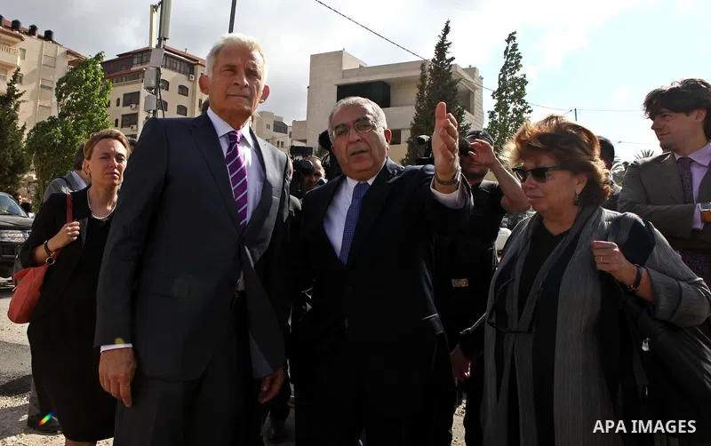European Parliament President Jerzy Buzek with Palestinian Prime Minister Salam Fayyad visit the so-called Area C, a closed military zone where Israel exercises full control in the West Bank city of Ramallah on June 14,...