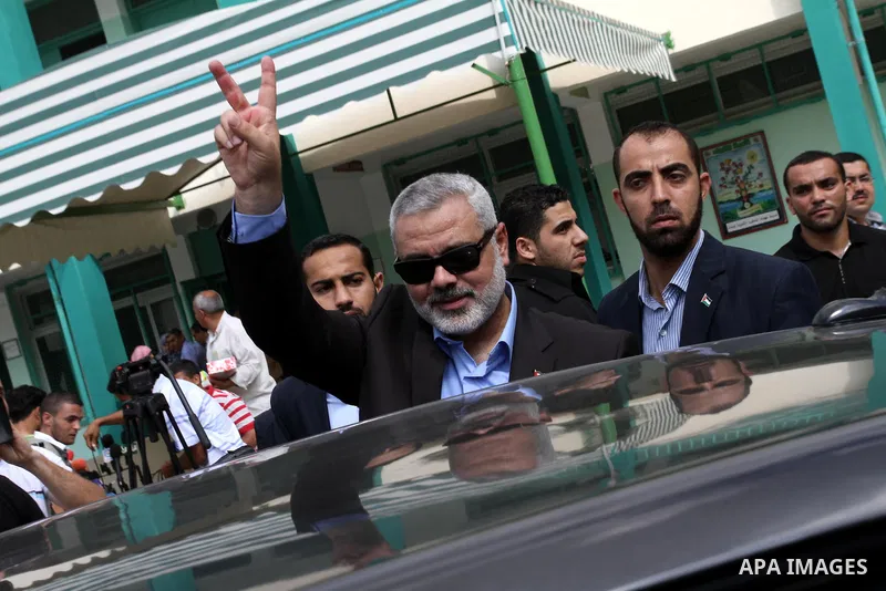 Palestinian Prime Minister in Gaza Strip, Ismail Haniya visits students as they sit for their final high school exams, known as "Tawjihi", in Gaza City on June 15, 2011. Photo by Mohammed Asad