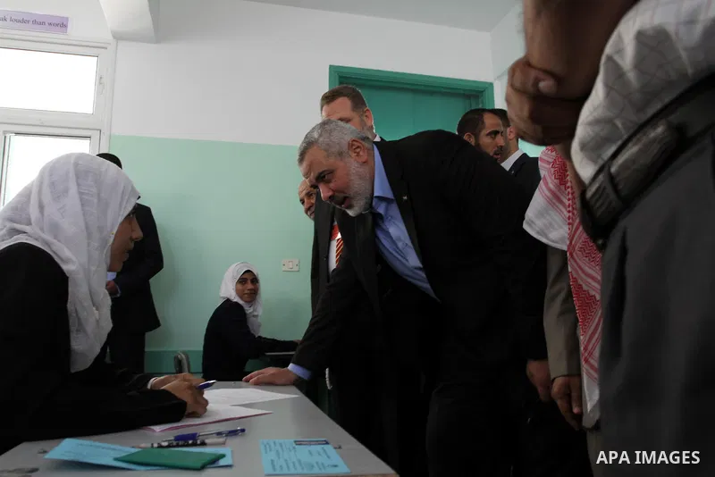 Palestinian Prime Minister in Gaza Strip, Ismail Haniya visits students as they sit for their final high school exams, known as "Tawjihi", in Gaza City on June 15, 2011. Photo by Mohammed Asad