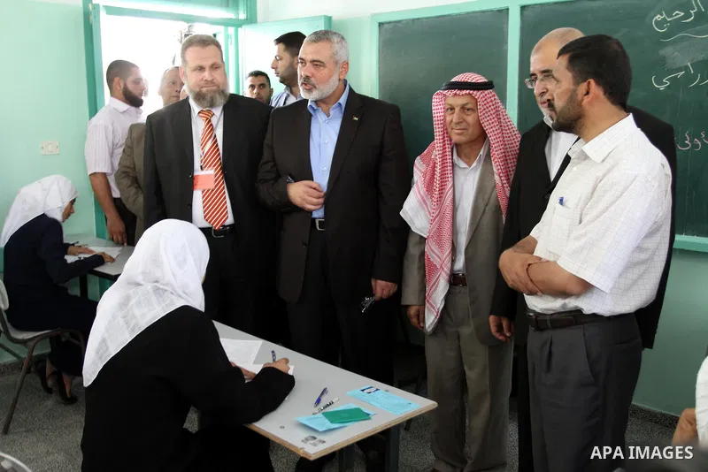 Palestinian Prime Minister in Gaza Strip, Ismail Haniya visits students as they sit for their final high school exams, known as "Tawjihi", in Gaza City on June 15, 2011. Photo by Mohammed Asad