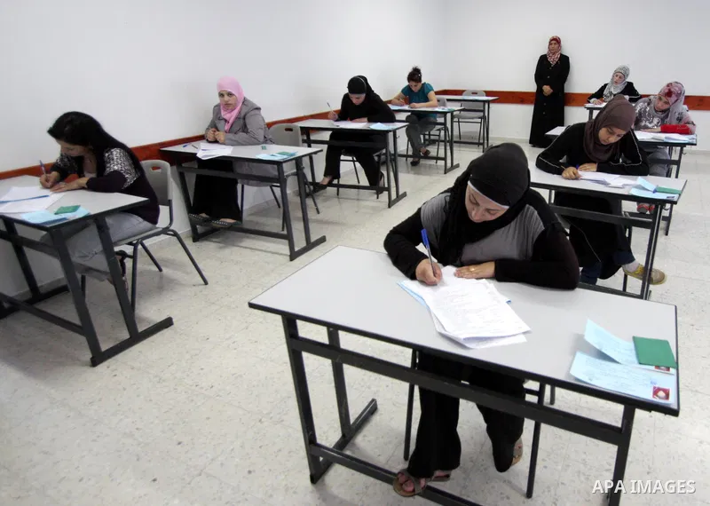 Palestinian students sit for their final high school exams, known as "Tawjihi", in the West Bank city of Bethlehem on June 15, 2011. Photo by STR