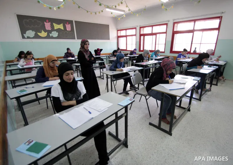Palestinian students sit for their final high school exams, known as "Tawjihi", in the West Bank city of Bethlehem on June 15, 2011. Photo by STR