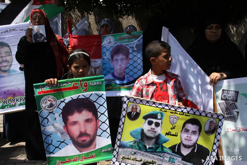 Palestinian jailed relatives take part in a protest calling for the release of Palestinian and Egyptian prisoners from the Israeli jails in front of the Egyptian Embassy in Gaza City on June 16, 2011. Photo by Mohammed A...