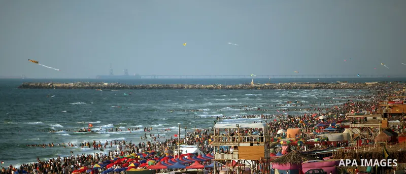 Palestinians on a beach in the west of Gaza City 17 June 2011. Reports state that during the summer the beach is a major venue for entertainment and leisure in the Gaza Strip. Photo by Ali Jadallah