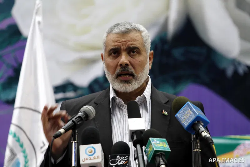 Palestinian Prime Minister in Gaza, Ismail Haniya delivers a speech during the memorial service of Mohammed Shama`, a leader of the Brotherhood and one of the founders of Hamas in the Islamic University in Gaza City on J...