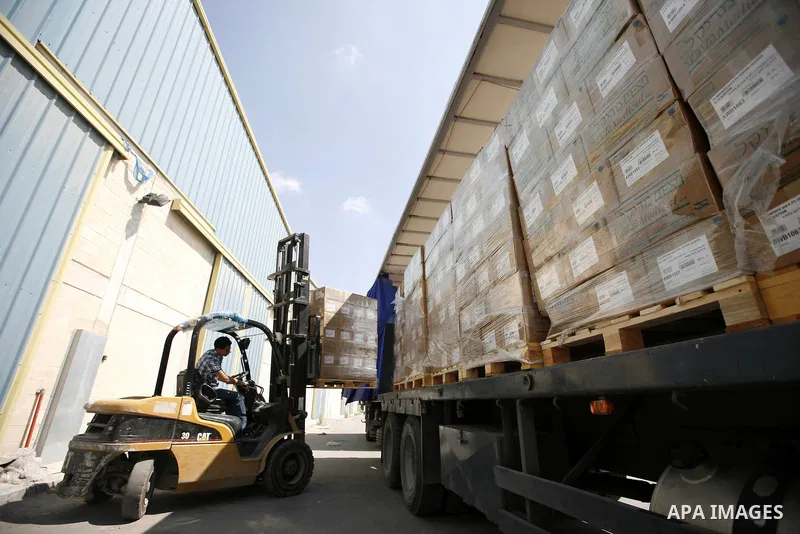 Palestinian Ministry of Health during moving convoy of twenty trucks carrying medicine to Gaza Strip from the west bank city of Nablus on June 18, 2011. Photo by Wagdi Eshtayah . ..