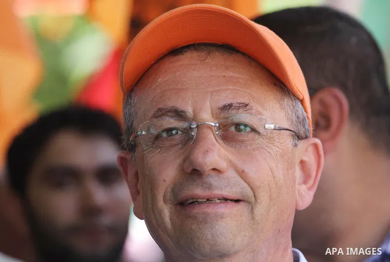The head of Palestinian National Initiative movement, Mustafa al-Barghuti participates in a rally to mark the ninth anniversary of the movement foundation in Gaza city on Jun 18,2011. Photo by Mohammed Asad