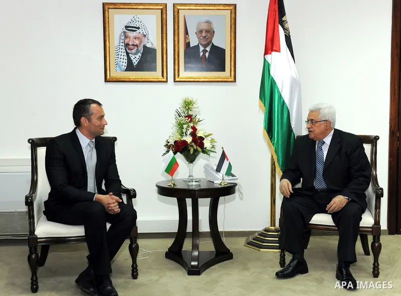 Palestinian President Mahmoud Abbas talks with Bulgarian Foreign Minister Nikolay Mladenov before their meeting June 18, 2011 in the West Bank city of Ramallah. Photo by Mufeed Abu Hasnah