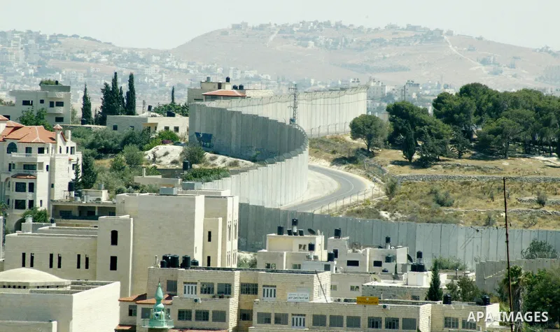 A view for a part of Israel's controversial separation barrier in jerusalem town of kubsa on June 19,2011. Israel says the projected 723 kilometres (454 miles) of steel and concrete walls, fences and barbed wire are need...