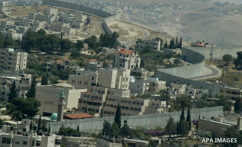 A view for a part of Israel's controversial separation barrier in jerusalem town of kubsa on June 19,2011. Israel says the projected 723 kilometres (454 miles) of steel and concrete walls, fences and barbed wire are need...
