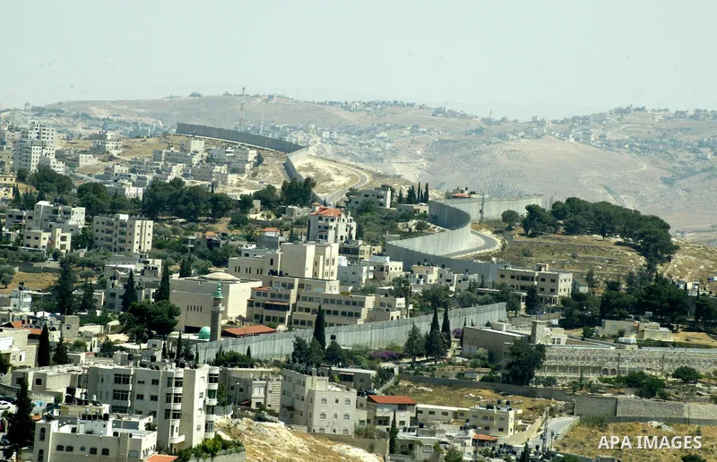 A view for a part of Israel's controversial separation barrier in jerusalem town of kubsa on June 19,2011. Israel says the projected 723 kilometres (454 miles) of steel and concrete walls, fences and barbed wire are need...