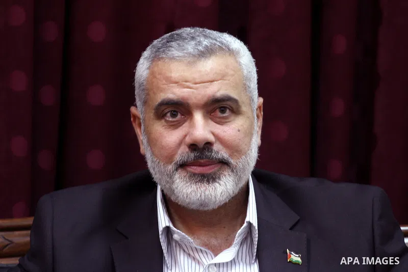 Palestinian Prime Minister in Gaza, Ismail Haniya during a meeting with the head of Palestinian National Initiative movement Mustafa Al-Barghuti in Gaza city on June 19, 2011. Photo by Mohammed Asad
