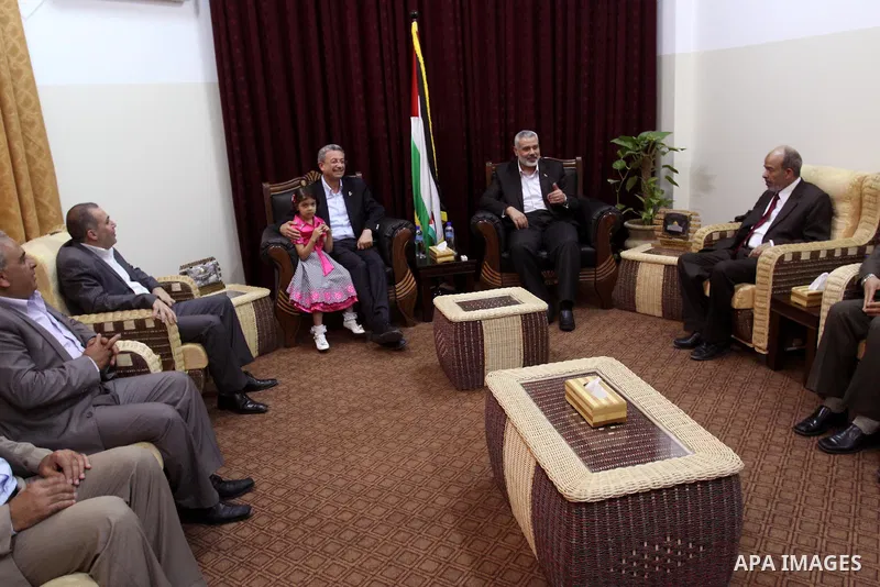 Palestinian Prime Minister in Gaza, Ismail Haniya during a meeting with the head of Palestinian National Initiative movement Mustafa Al-Barghuti in Gaza city on June 19, 2011. Photo by Mohammed Asad