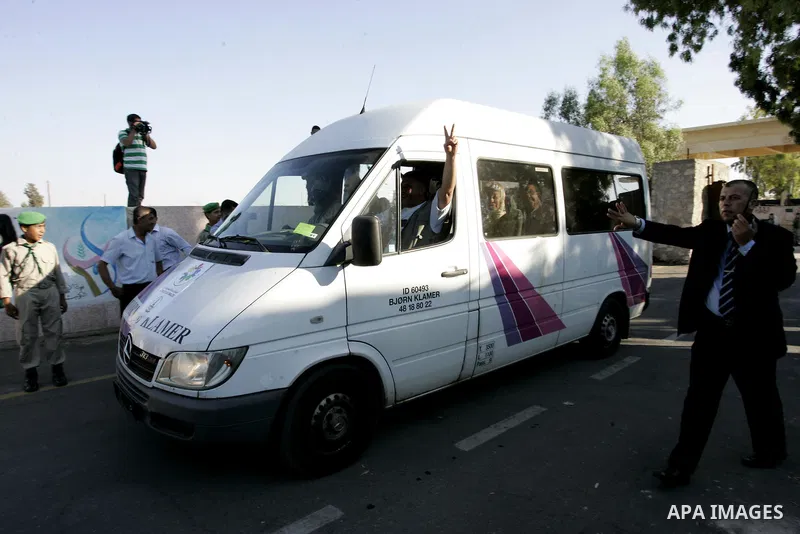 A convoy of "Miles of Smiles 3" carrying medical aid to Gaza crosses the Rafah crossing into the southern Gaza Strip from Egypt on June 19, 2011. The convoy, carrying medical aid for the impoverished Palestinian territor...