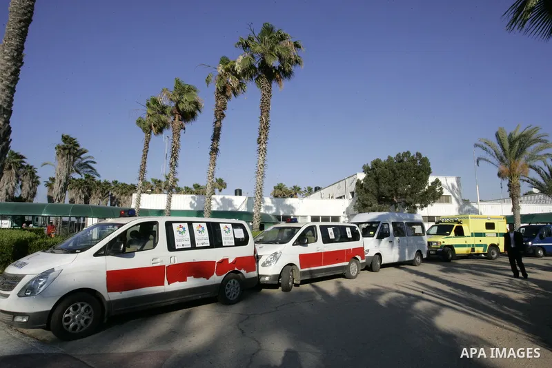 A convoy of "Miles of Smiles 3" carrying medical aid to Gaza crosses the Rafah crossing into the southern Gaza Strip from Egypt on June 19, 2011. The convoy, carrying medical aid for the impoverished Palestinian territor...