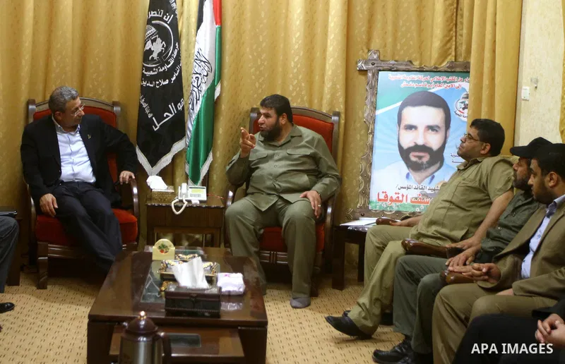 The head of Palestinian National Initiative movement Mustafa Al-Barghuti during a meeting with the head secretary general of the Popular Resistance Movement, Zakareya Doghmush in Gaza city on June 20, 2011. Photo by Ashr...