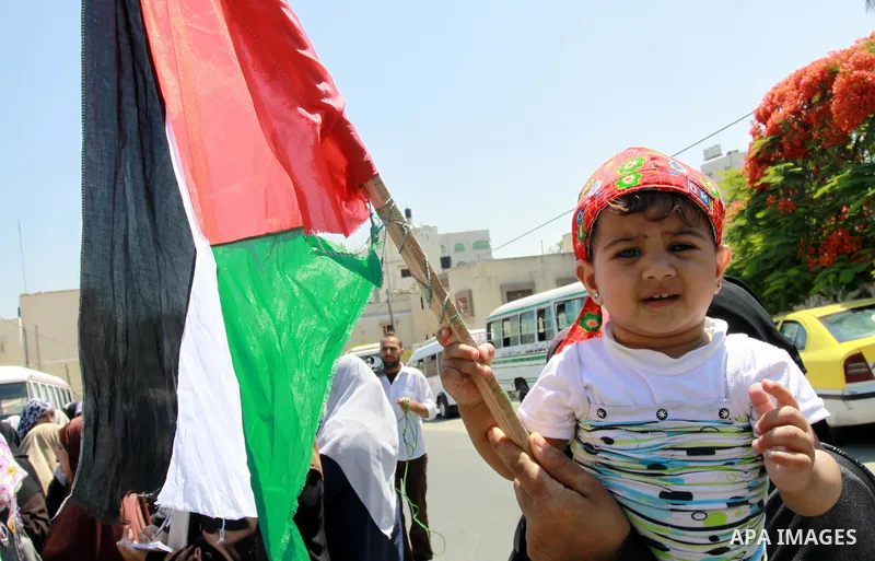 Palestinian women supporters of the Islamist movement Hamas demonstrate against the introduction of a ban on the wearing of veils in France, on June 20, 2011 in front of the French Cultural Center in Gaza City. Photo by...