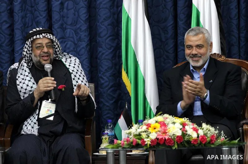 Palestinian Prime Minister in Gaza Strip, Ismail Haniya meets with members of the "Miles of Smiles 3" aid convoy in his office in Gaza city on Jun 20,2011. The convoy, carrying medical aid for the impoverished Palestinia...