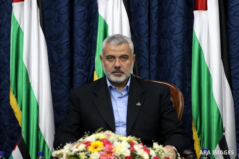Palestinian Prime Minister in Gaza Strip, Ismail Haniya meets with members of the "Miles of Smiles 3" aid convoy in his office in Gaza city on Jun 20,2011. The convoy, carrying medical aid for the impoverished Palestinia...