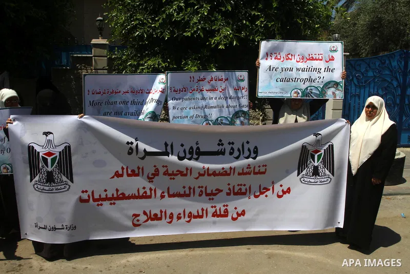 Palestinian Ministry of Women's Affairs protest about the lack of medicine and demanding for the introduction of medicines in Gaza city on June 22, 2011. Photo by Ashraf amra