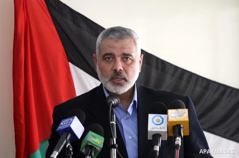 Palestinian prime minister in Gaza Strip, Ismail Haniya attends the opening of Aman centre for Palestinian women care in Gaza city on Jun 22,2011. Photo by Mohammed Asad