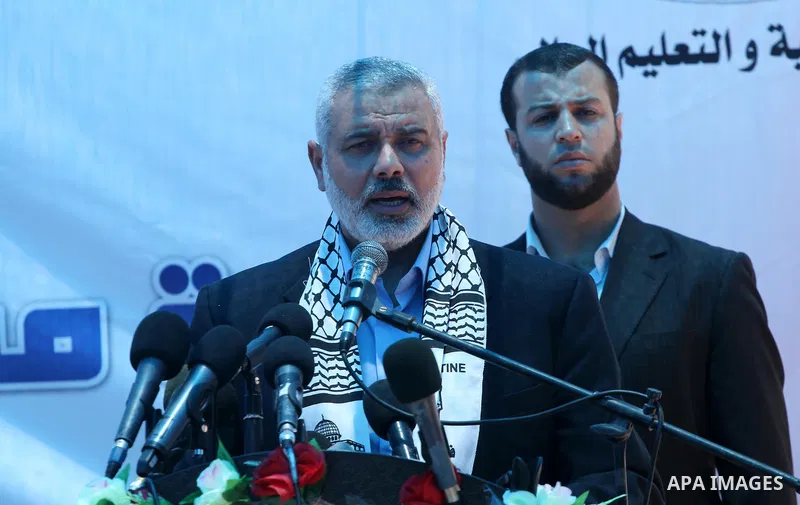 Palestinian prime minister in Gaza Strip, Ismail Haniya attends the opening of the first school in Palestine for deaf students, in Gaza city on Jun 22,2011. Photo by Mohammed Asad