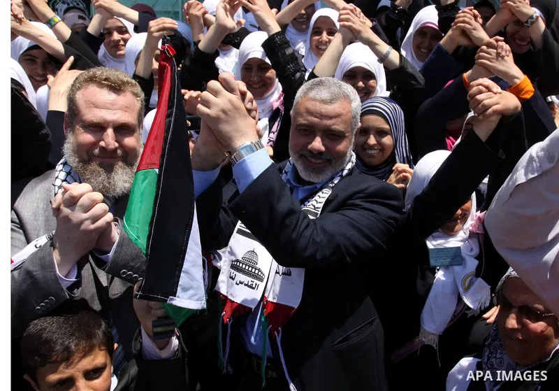 Palestinian prime minister in Gaza Strip, Ismail Haniya attends the opening of the first school in Palestine for deaf students, in Gaza city on Jun 22,2011. Photo by Mohammed Asad