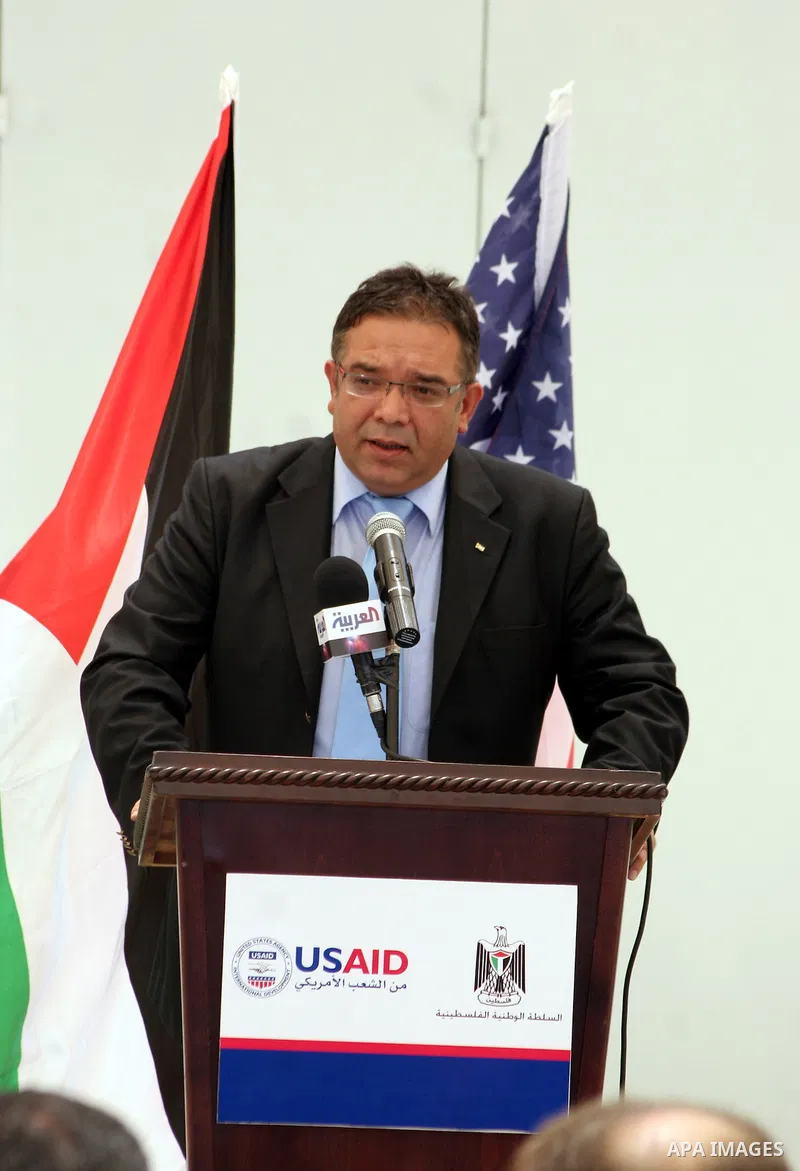 Shaddad Atilli, head of Palestinian Water Authority delivers speech during the inauguration ceremony for well stations rehabilitation project in the southern West Bank village of Tuqu'a, which was financed by the US Agen...