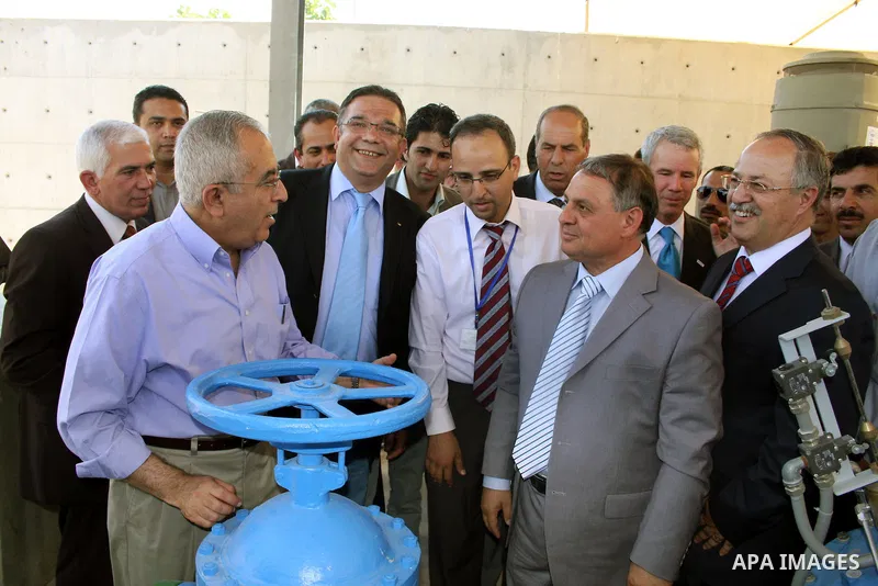 Palestinian prime minister Salam Fayyad attends the inauguration ceremony for well stations rehabilitation project in the southern West Bank village of Tuqu'a, which was financed by the US Agency for international Develo...