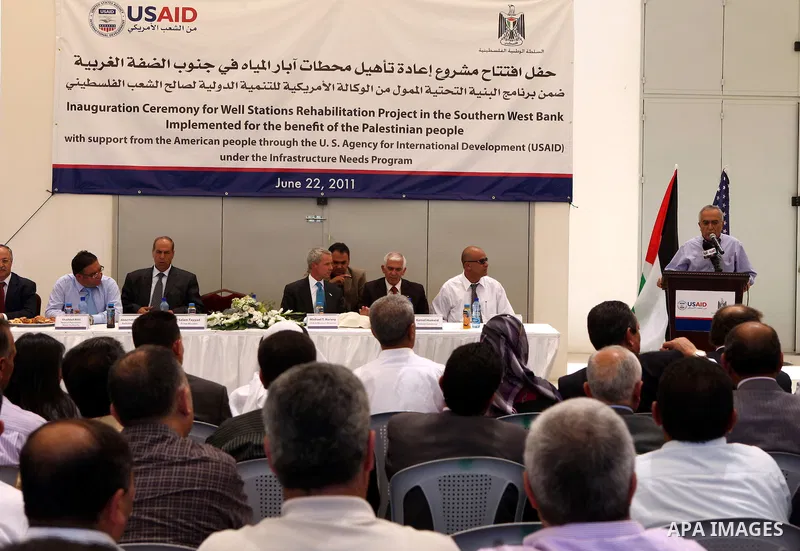 Palestinian prime minister Salam Fayyad attends the inauguration ceremony for well stations rehabilitation project in the southern West Bank village of Tuqu'a, which was financed by the US Agency for international Develo...